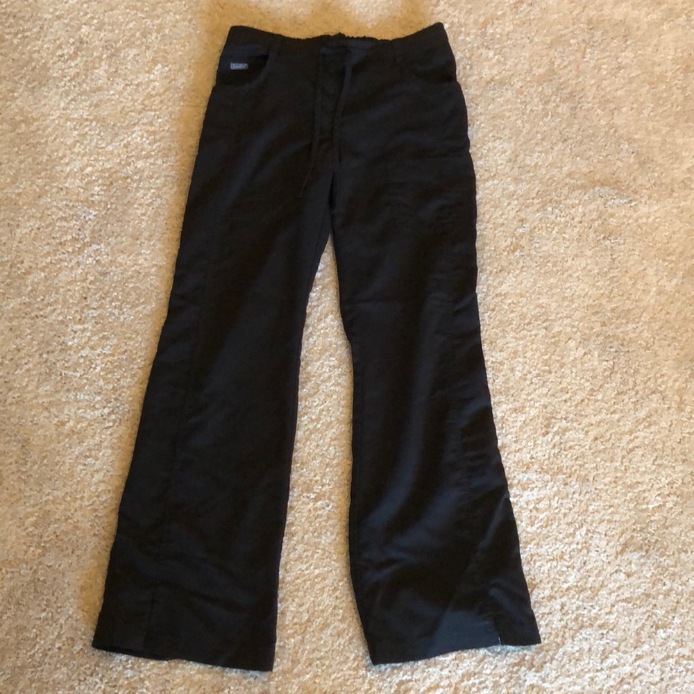 Black scrub pants.